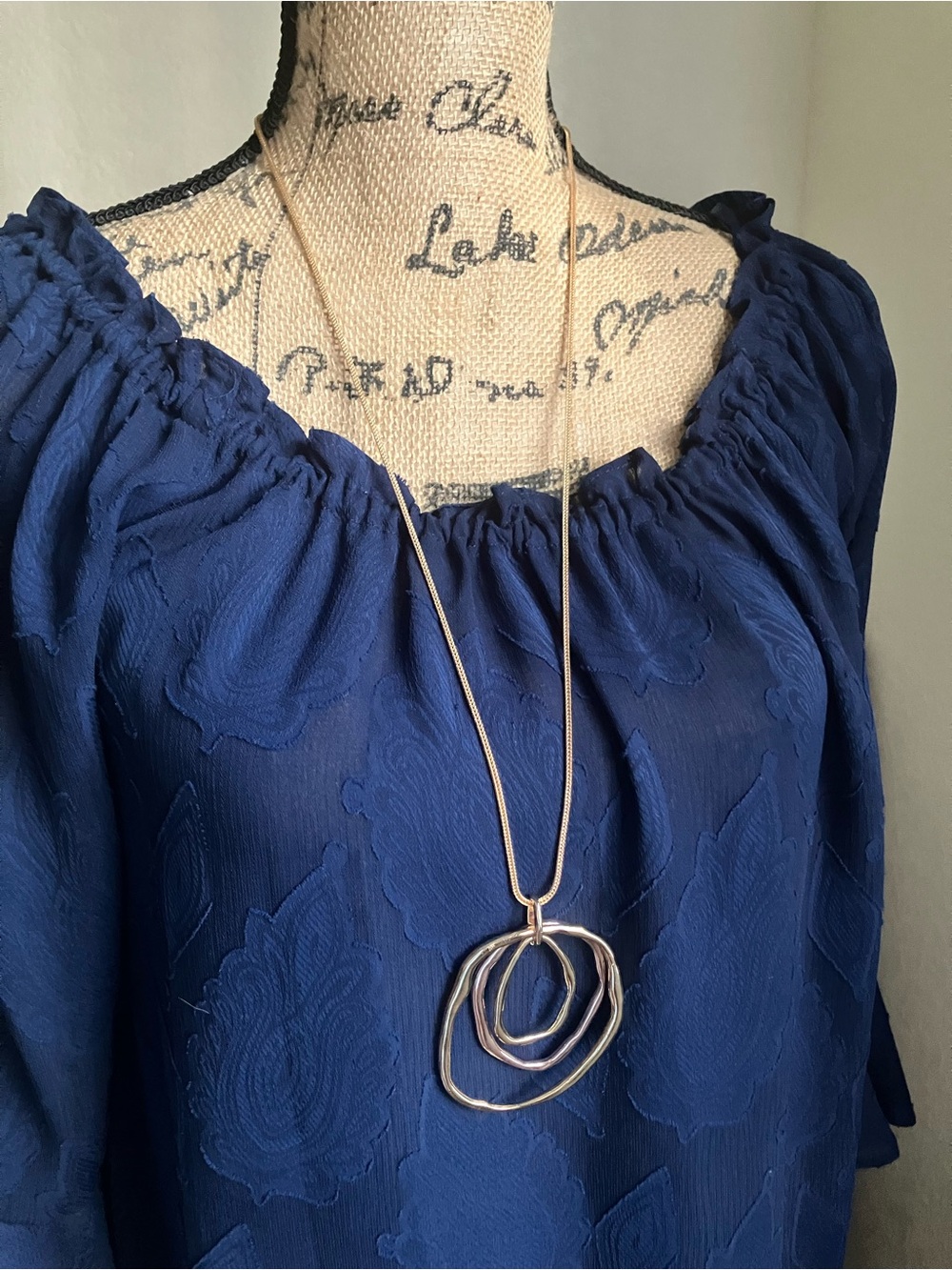 Abstract gold pendant necklace and earrings